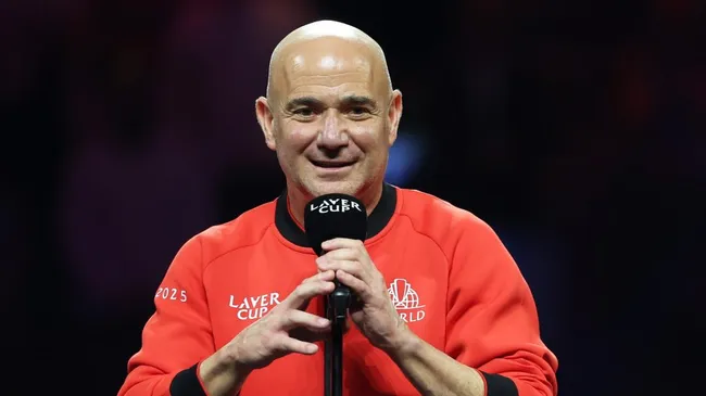 Ā© Clive Brunskill/Getty Images Agassi after winning with Team World at Laver Cup