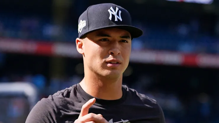 Anthony Volpe #11 of the New York Yankees looks on.