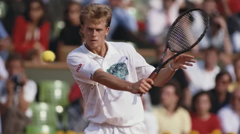 Stefan Edberg of Sweden makes a backhand volley.