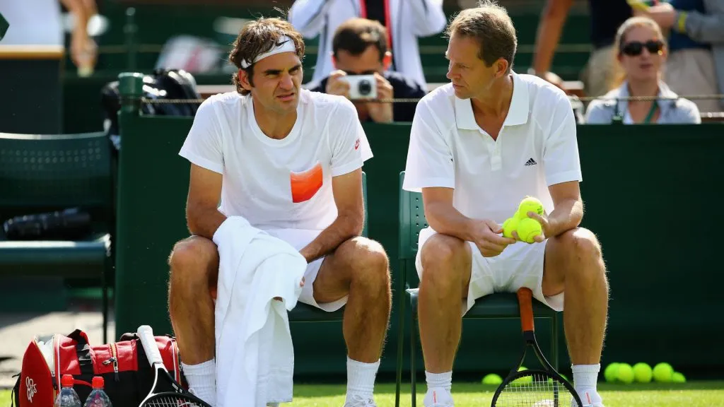 Roger Federer talks with his coach Stefan Edberg during a practice session. (Getty Images)