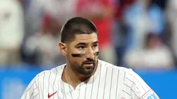 Nick Castellanos looks on.