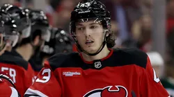 Luke Hughes #43 of the New Jersey Devils celebrates his goal with teammates.