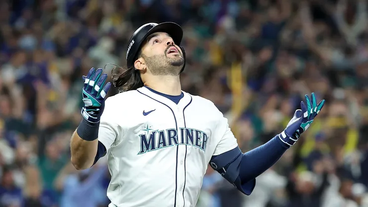 Eugenio Suarez reacts after hitting a grand slam against the Blue Jays during on October 17, 2025 in Seattle, Washington.