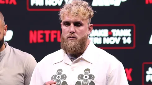 Jake Paul poses during a press conference.