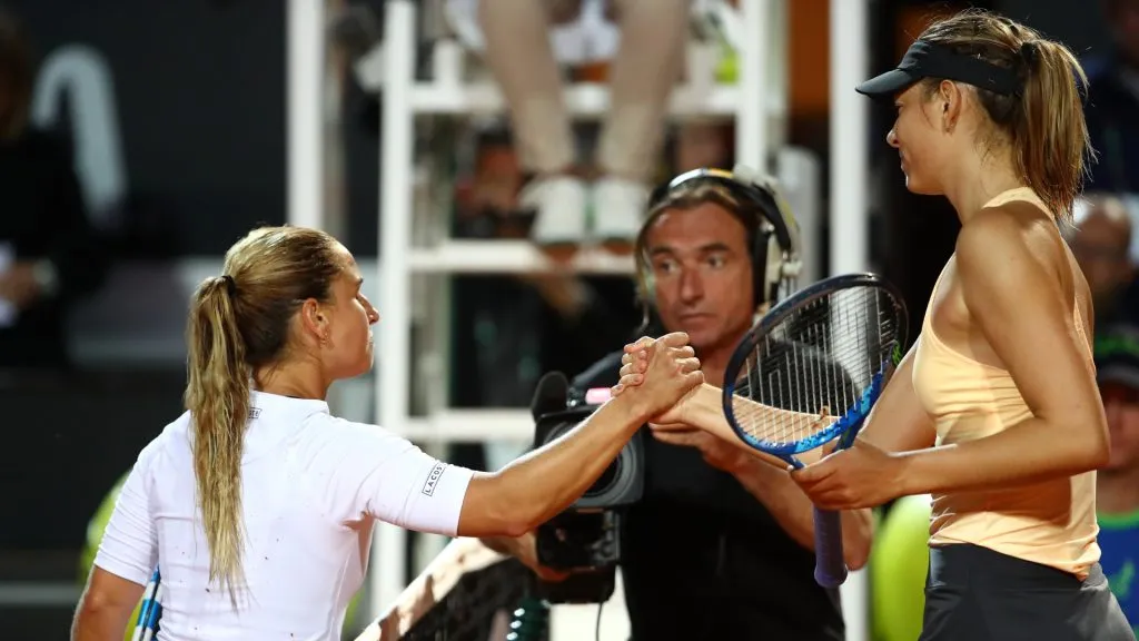 Maria Sharapova shakes hands with Dominika Cibulkova after a game. (Getty Images)