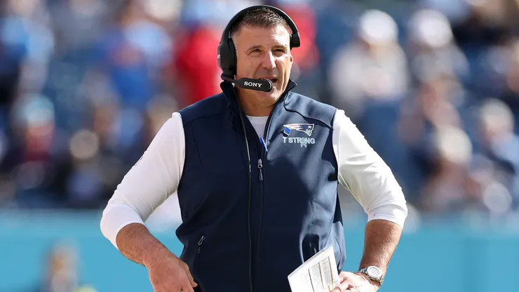 Head coach Mike Vrabel of the New England Patriots looks on.