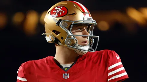 Mac Jones #10 of the San Francisco 49ers looks on.