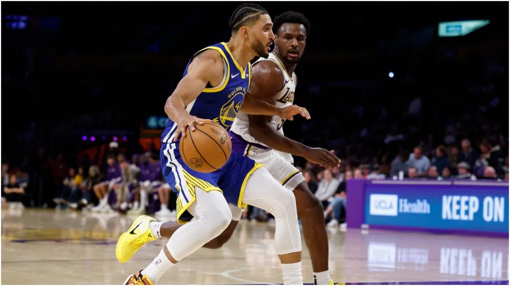 Jackson Rowe of the Golden State Warriors controls the ball against Bronny James of the Los Angeles Lakers – Ronald Martinez/Getty Images