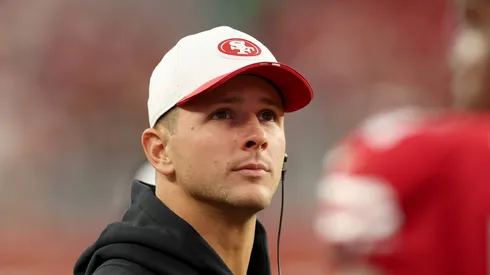 Brock Purdy stands on the sidelines vs the Chargers on August 23, 2025 in Santa Clara, California.