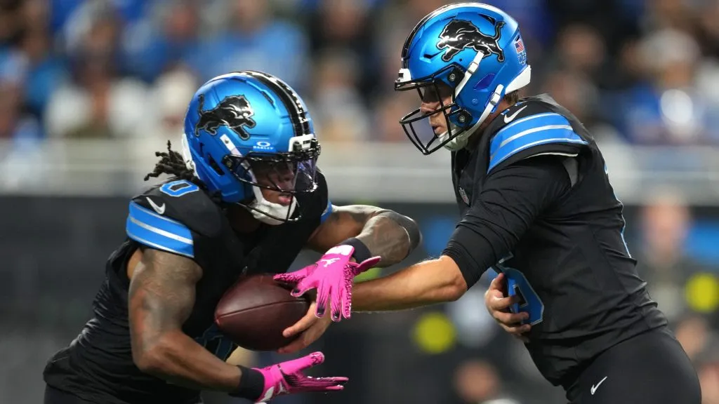 Jahmyr Gibbs with Jared Goff