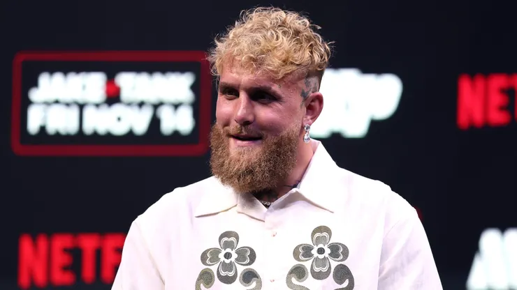 Jake Paul looks on during a press conference.