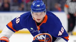 Matthew Schaefer #48 of the Islanders skates with the puck.