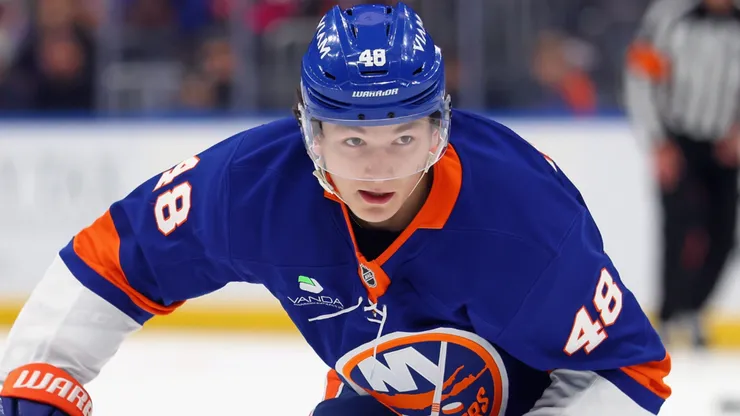 Matthew Schaefer #48 of the Islanders skates with the puck.