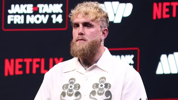 Jake Paul looks on during a press conference.