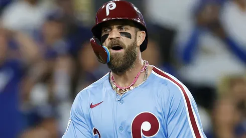 Bryce Harper #3 of the Philadelphia Phillies reacts as he scores.