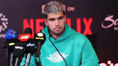 Carlos Alcaraz speaks during a press conference.