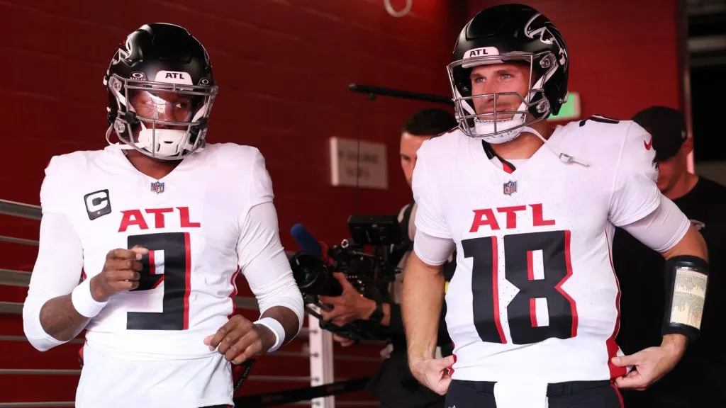 Kirk Cousins with Michael Penix Jr.