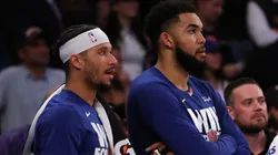Josh Hart #3 and Karl-Anthony Towns of the New York Knicks react on the bench.