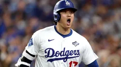 Shohei Ohtani #17 of the Los Angeles Dodgers celebrates after hitting a home run.