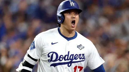 Shohei Ohtani #17 of the Los Angeles Dodgers celebrates after hitting a home run.