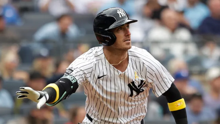 Cody Bellinger #35 of the New York Yankees throws his bat.