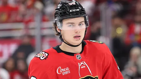Connor Bedard #98 of the Blackhawks looks on against the Senators.