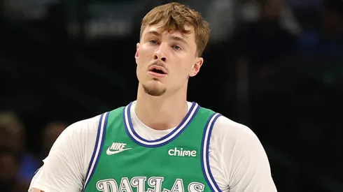 Cooper Flagg #32 of the Dallas Mavericks walks backcourt.