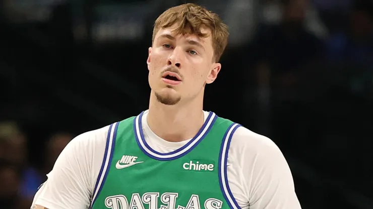 Cooper Flagg #32 of the Dallas Mavericks walks backcourt.