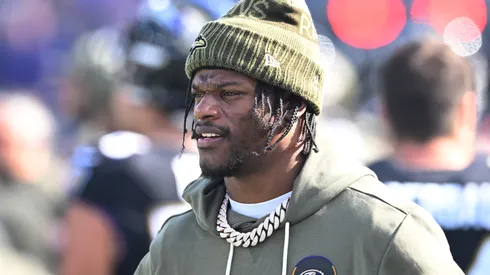 Lamar Jackson #8 of the Baltimore Ravens looks on.