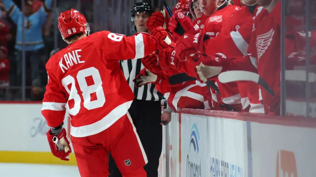 Patrick Kane #88 of the Red Wings celebrates his second period goal with teammates. Gregory Shamus/Getty Images