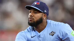 Vladimir Guerrero Jr. #27 of the Toronto Blue Jays flips a ball.