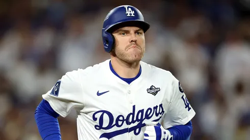 Freddie Freeman #5 of the Los Angeles Dodgers advances to first base.