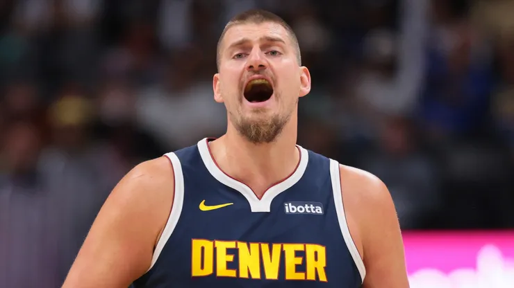 Nikola Jokic #15 of the Denver Nuggets handles the ball.