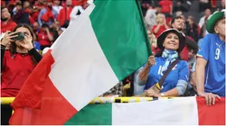 A fan waves the national flag of Italy