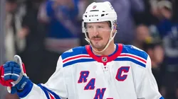 J.T. Miller #8 of the New York Rangers salutes the crowd.