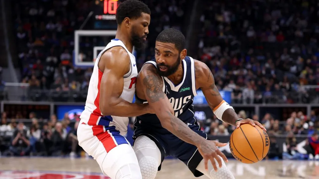 Kyrie Irving of the Mavericks tries to get around Malik Beasley of the Pistons in 2025. (Source: Gregory Shamus/Getty Images)