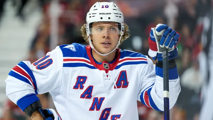 Artemi Panarin #10 of the Rangers during a break in play against the Flames.