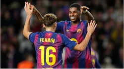 Marcus Rashford of FC Barcelona celebrates with teammate Fermin Lopez