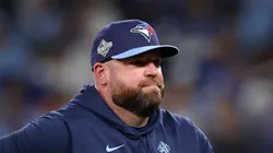 John Schneider walks to the dugout after changing pitchers on October 31, 2025 in Toronto, Ontario.