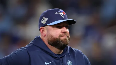 John Schneider walks to the dugout after changing pitchers on October 31, 2025 in Toronto, Ontario.