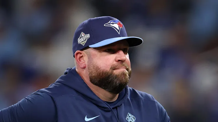John Schneider walks to the dugout after changing pitchers on October 31, 2025 in Toronto, Ontario.