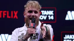 Jake Paul speaks at a news conference.