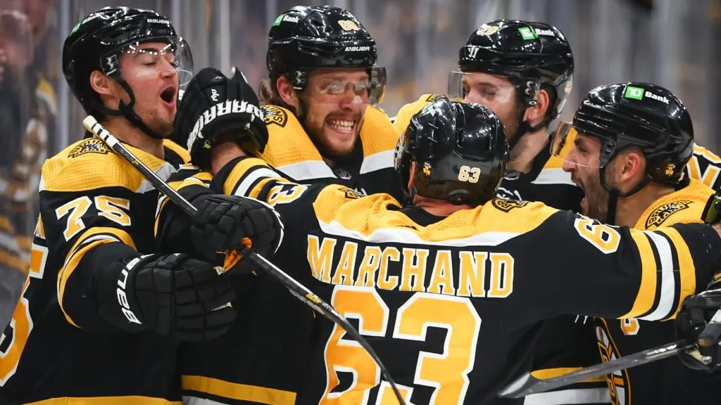 David Pastrnak #88 of the Boston Bruins reacts with teammates in 2022. (Source: Adam Glanzman/Getty Images)