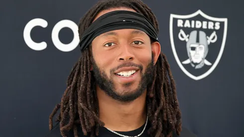 Jakobi Meyers smiles at a press conference.