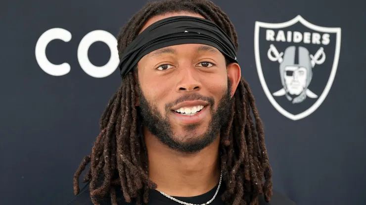 Jakobi Meyers smiles at a press conference.