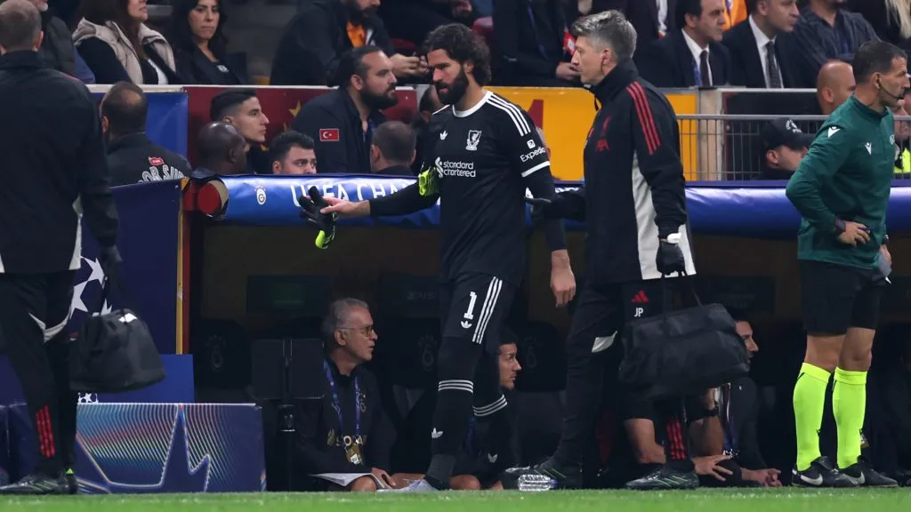 Alisson leaves the pitch against Galatasary following an injury. (Getty Images)