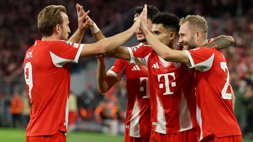 Luis Diaz of Bayern Munich celebrates scoring his team’s third goal with his teammates. (Getty)