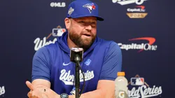 Manager John Schneider #14 of the Toronto Blue Jays speaks to the media.