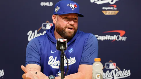 Manager John Schneider #14 of the Toronto Blue Jays speaks to the media.