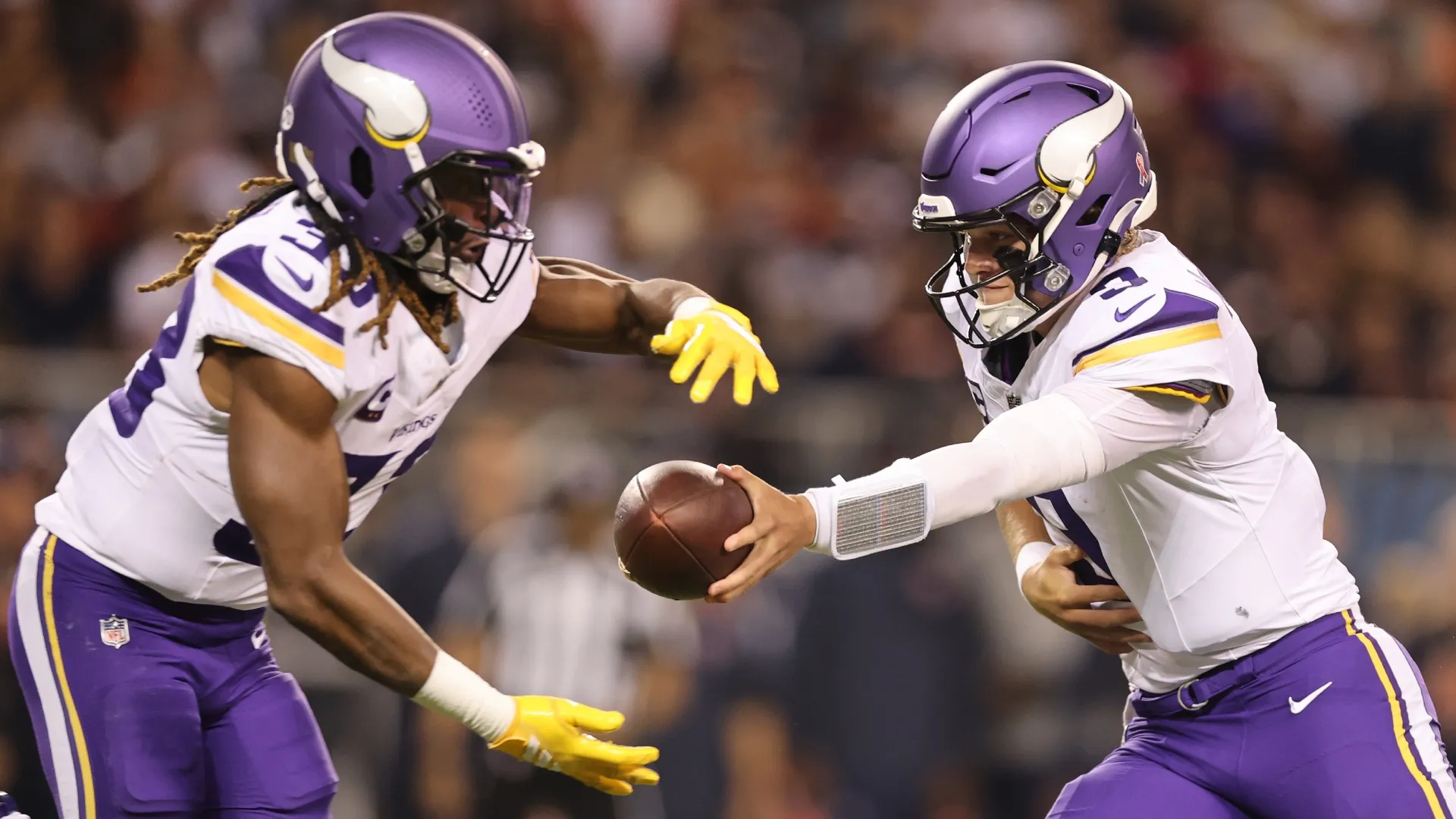 JJ McCarthy with Aaron Jones